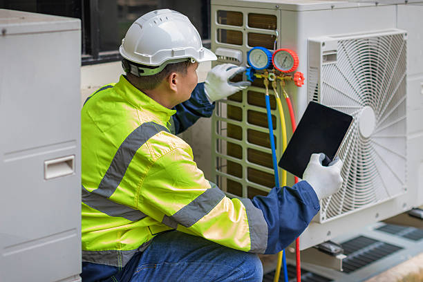 Professional Air Duct Cleaning technician working in Blakely, PA